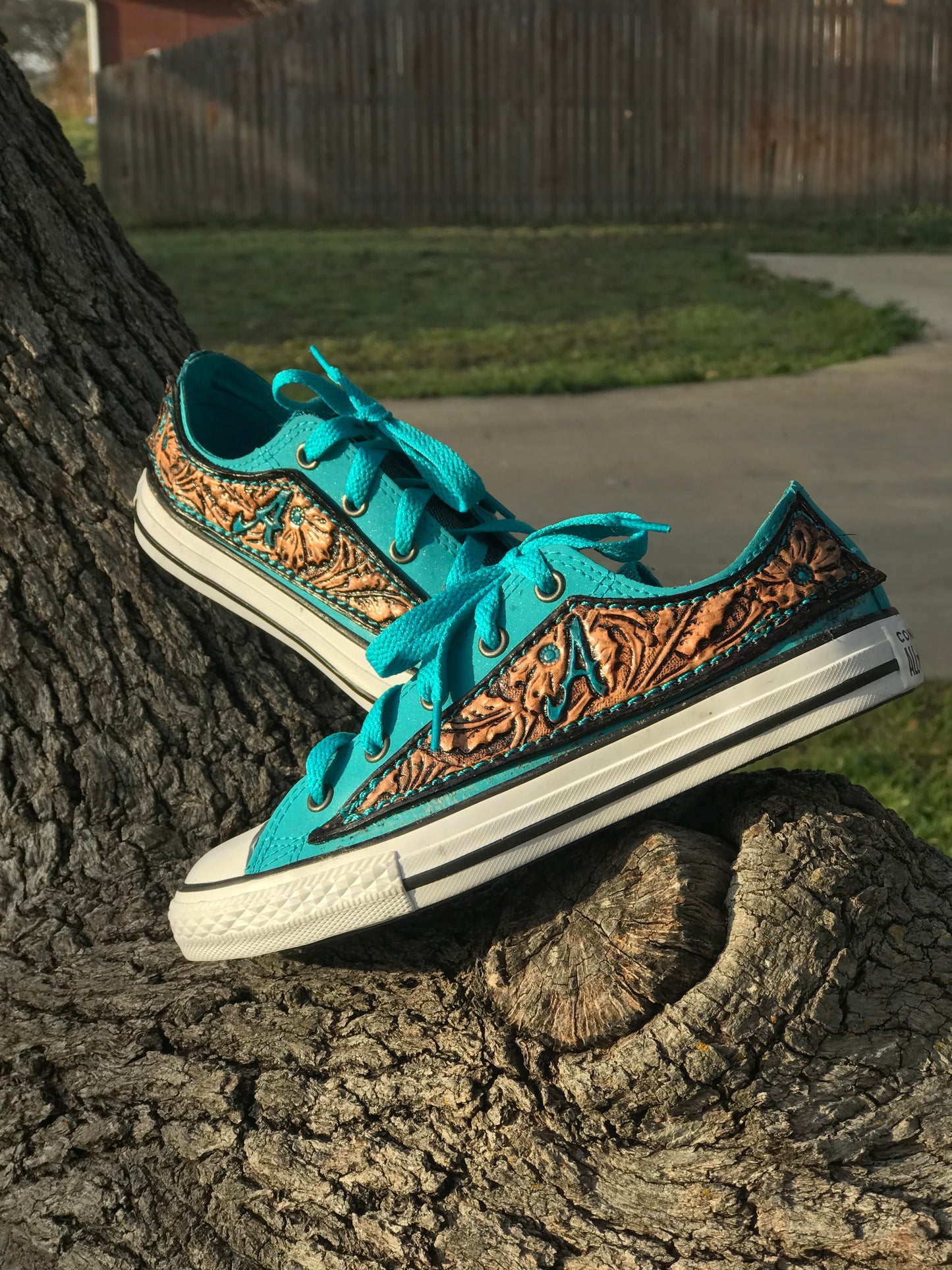 Custom Chucks with tooled leather