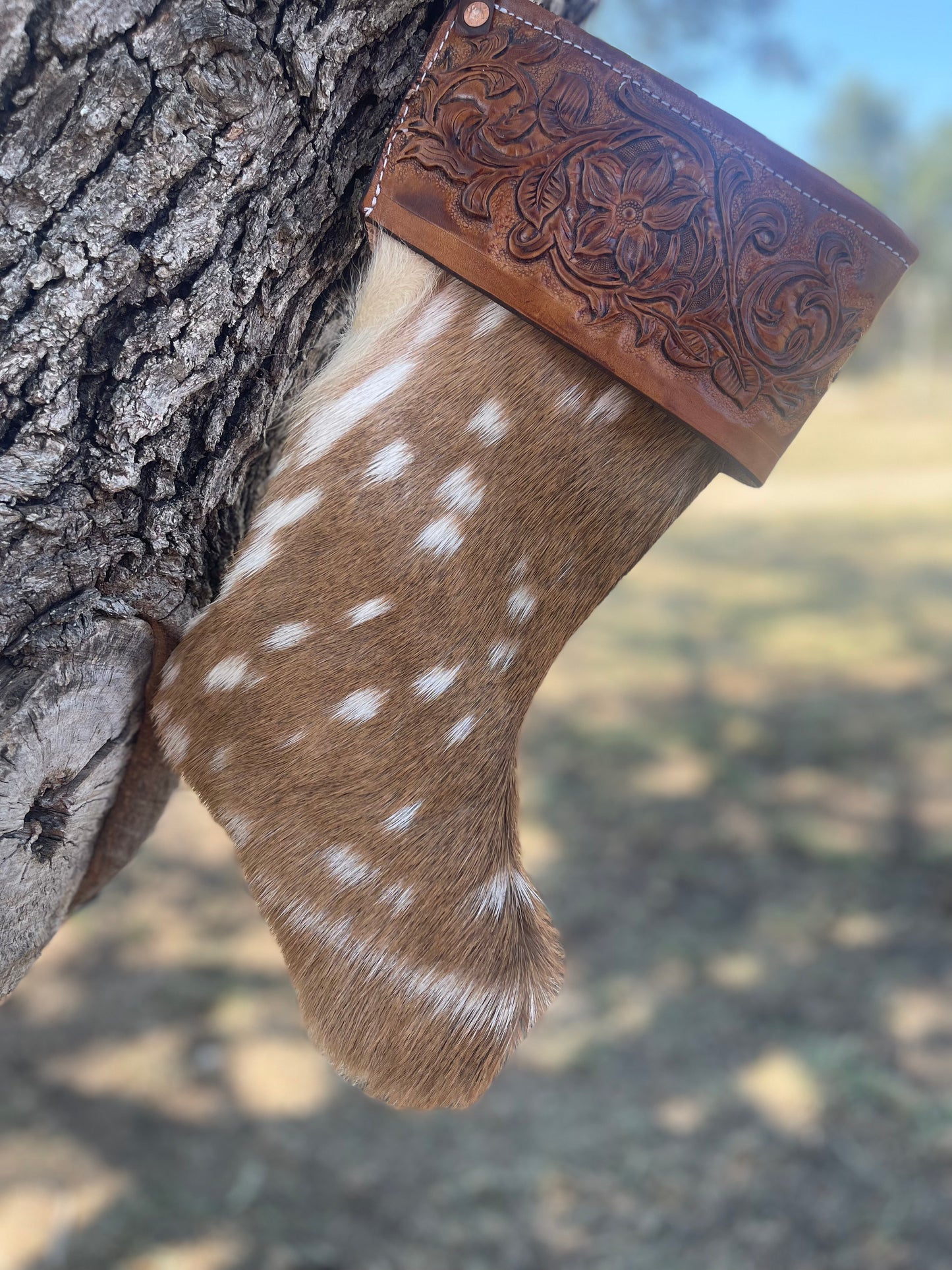 Axis and tooled leather Christmas stocking