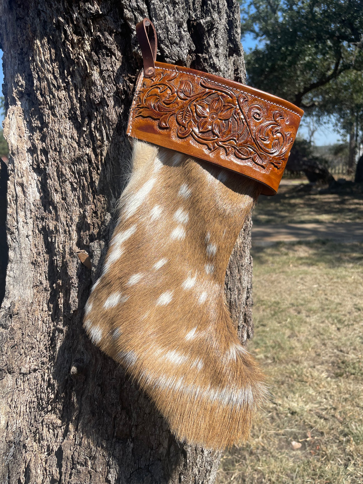 Axis and tooled leather Christmas stocking